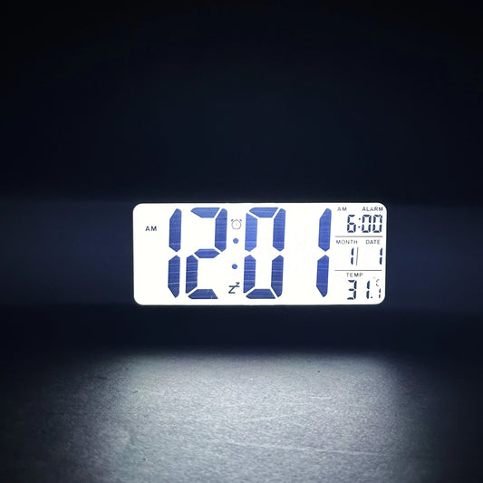 Black LCD Table Alarm Clock with Auto Sensor Light.